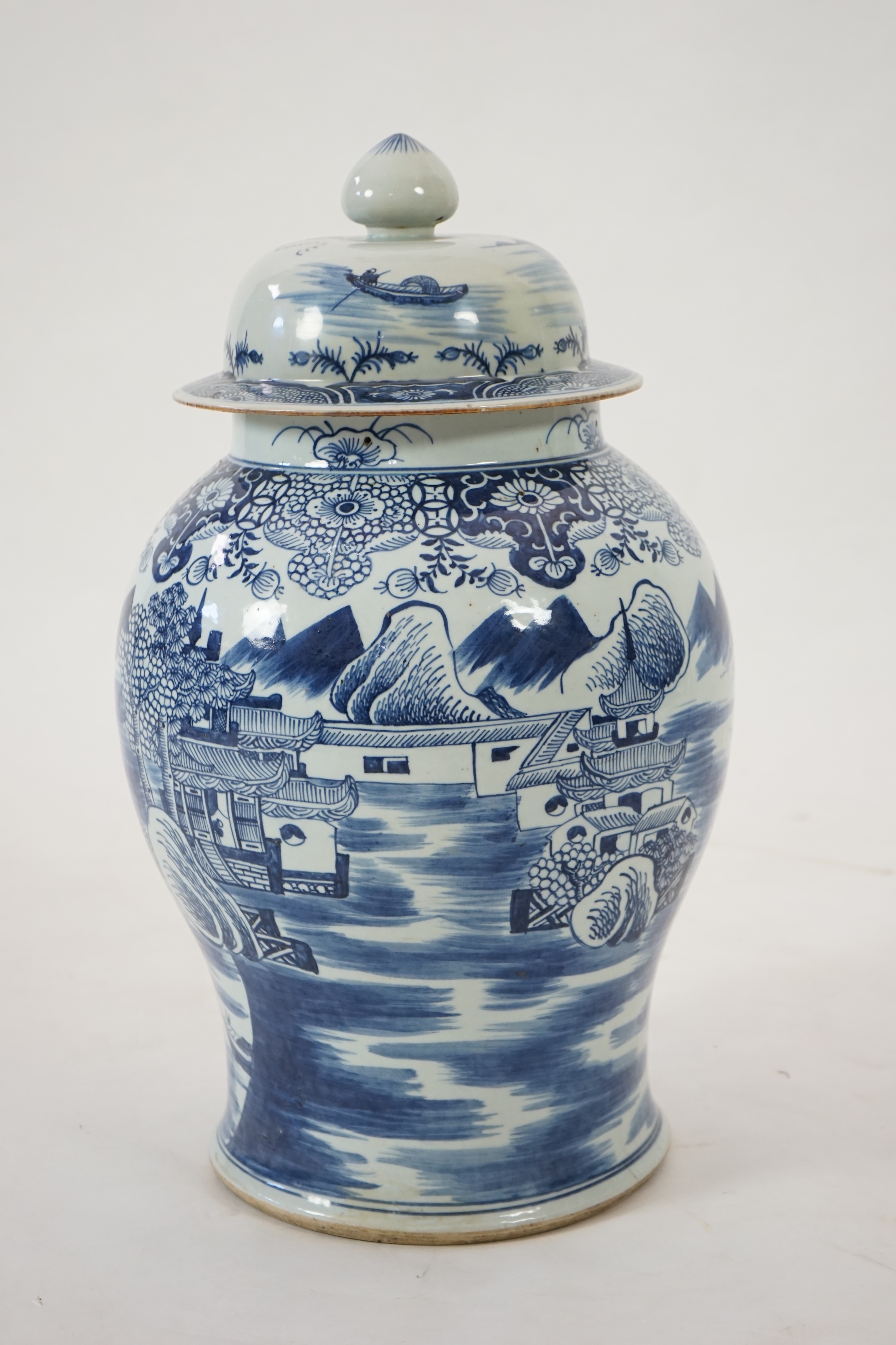 A massive Chinese blue and white ‘temple’ jar and cover, Qianlong period